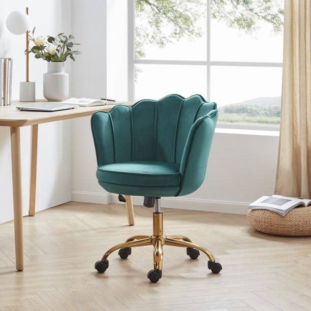 The teal desk chair.