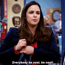 a gif from Brooklyn 99 of someone saying &quot;everybody be cool, be cool!&quot;