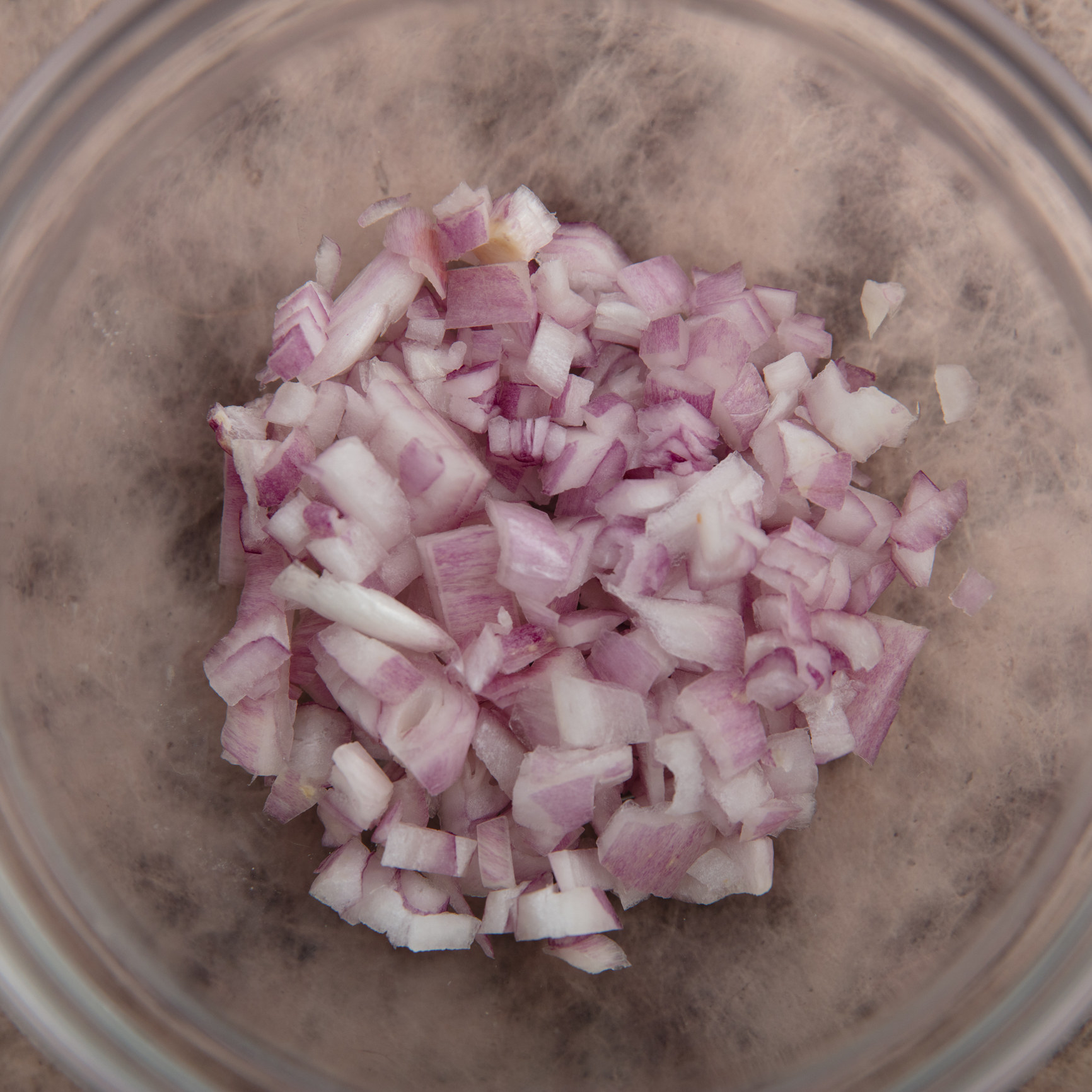 Chopped shallots in a bowl.