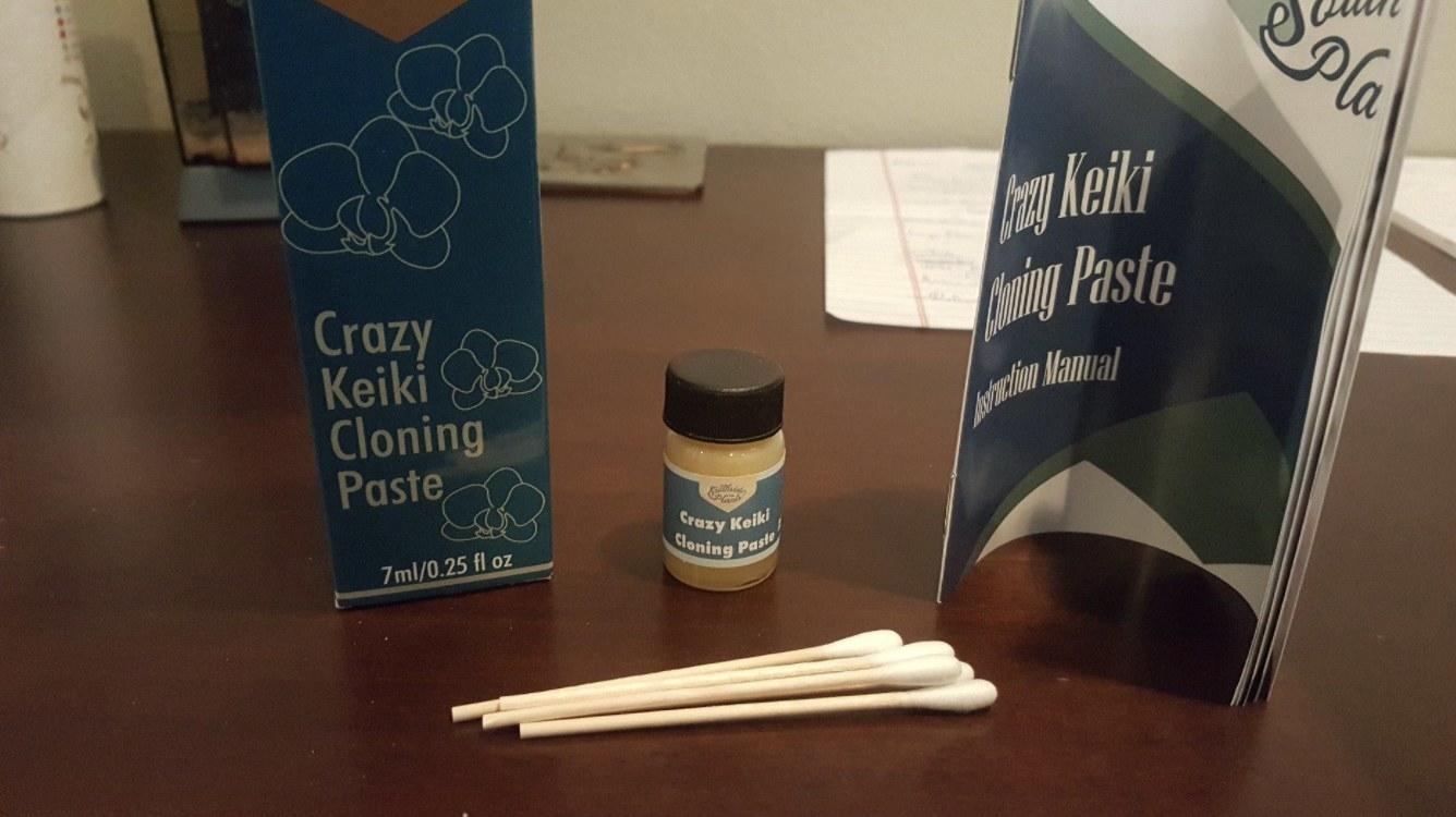 Bottle of crazy keikei cloning paste on table