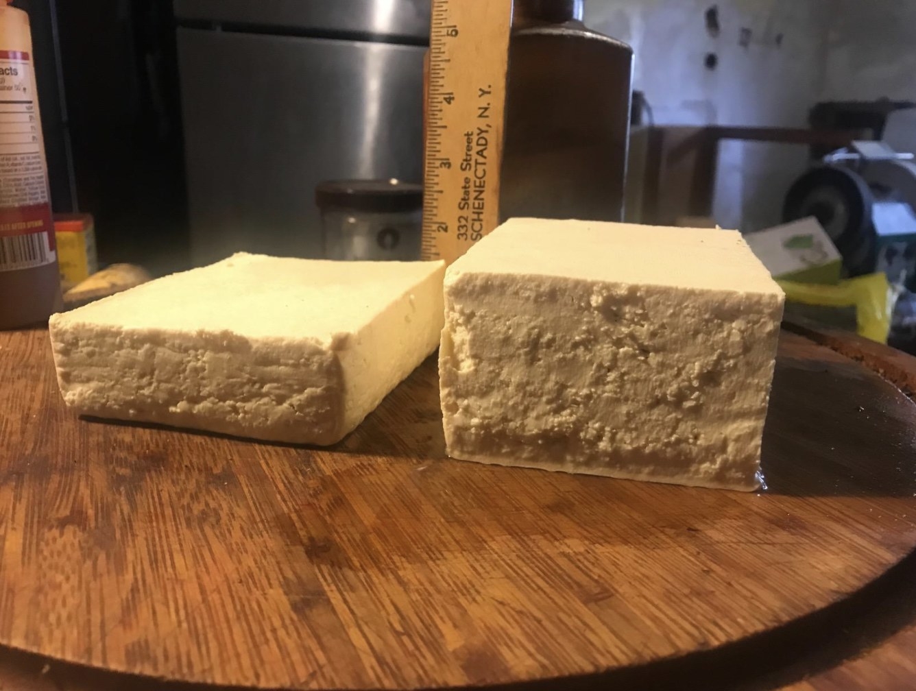 Tofu pressed on table