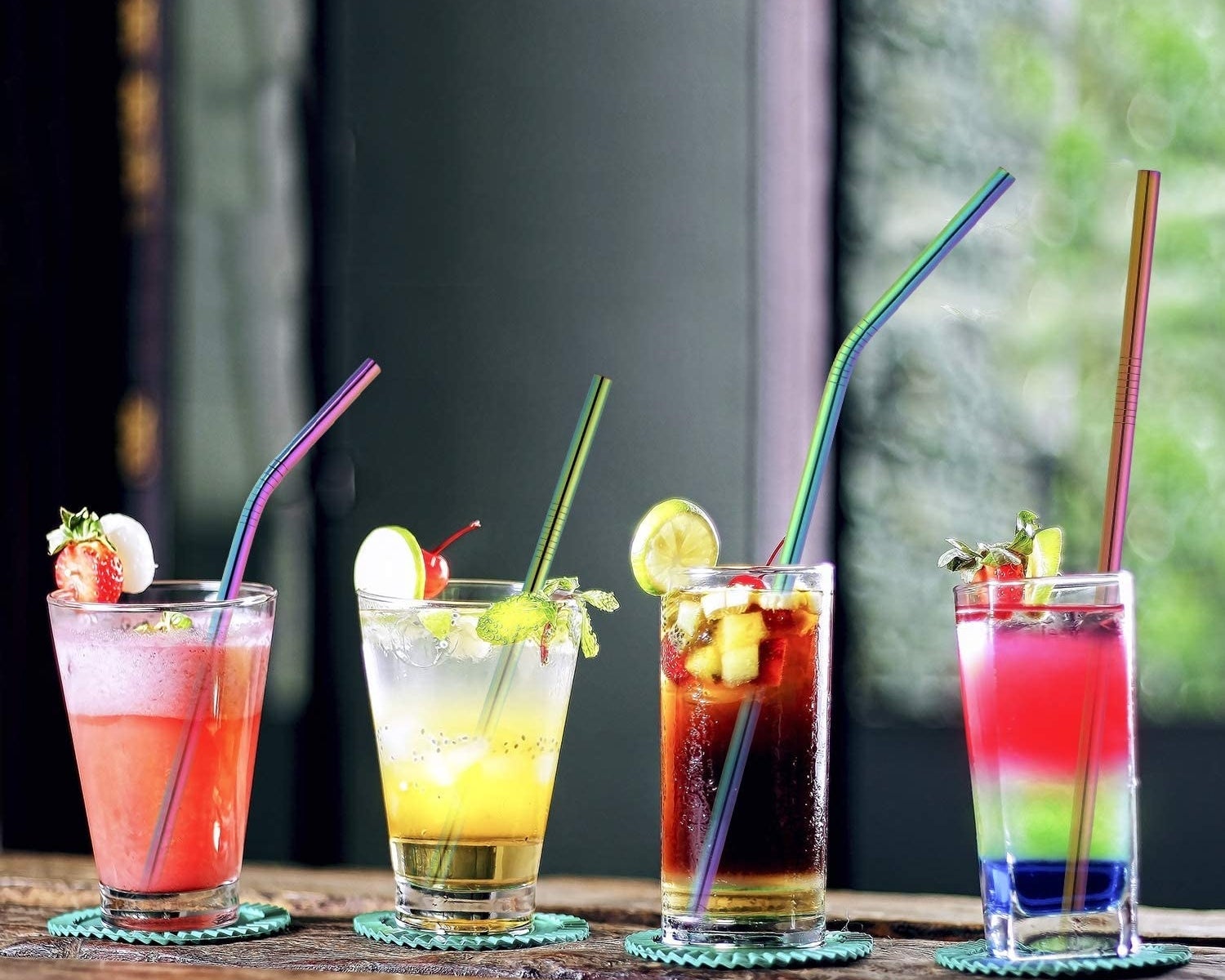 iridescent reusable straws in cocktail glasses