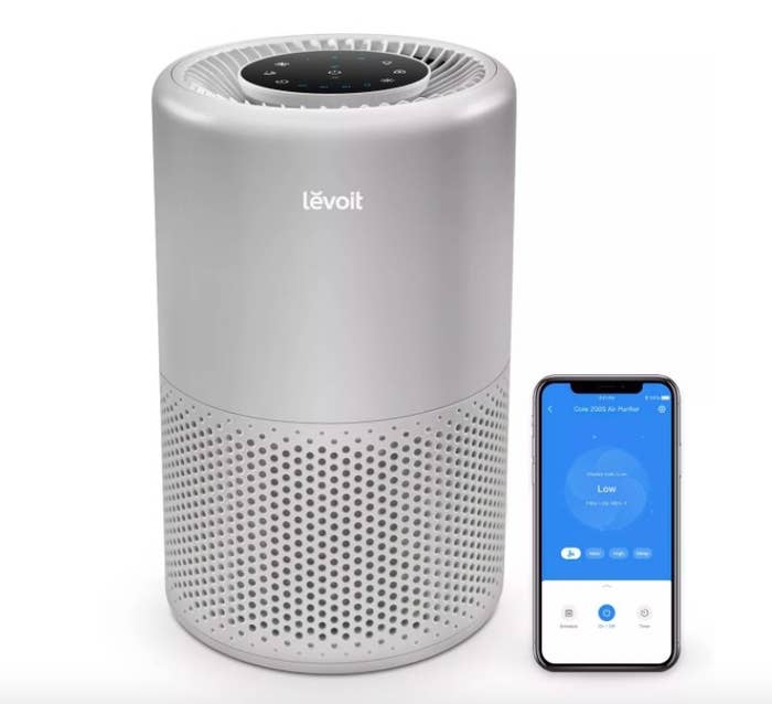 Air purifier and smart phone showing app