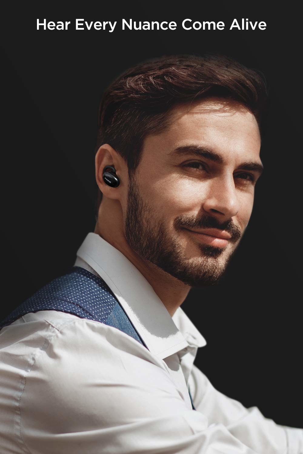 A man wearing wireless earphones