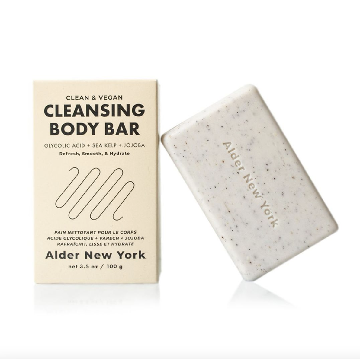 Cleansing Body Bar leaning against its box
