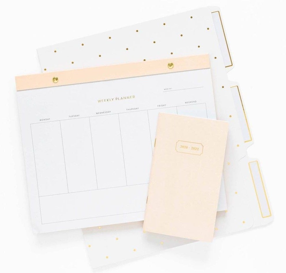 The white and blush pink weekly desktop planning pad