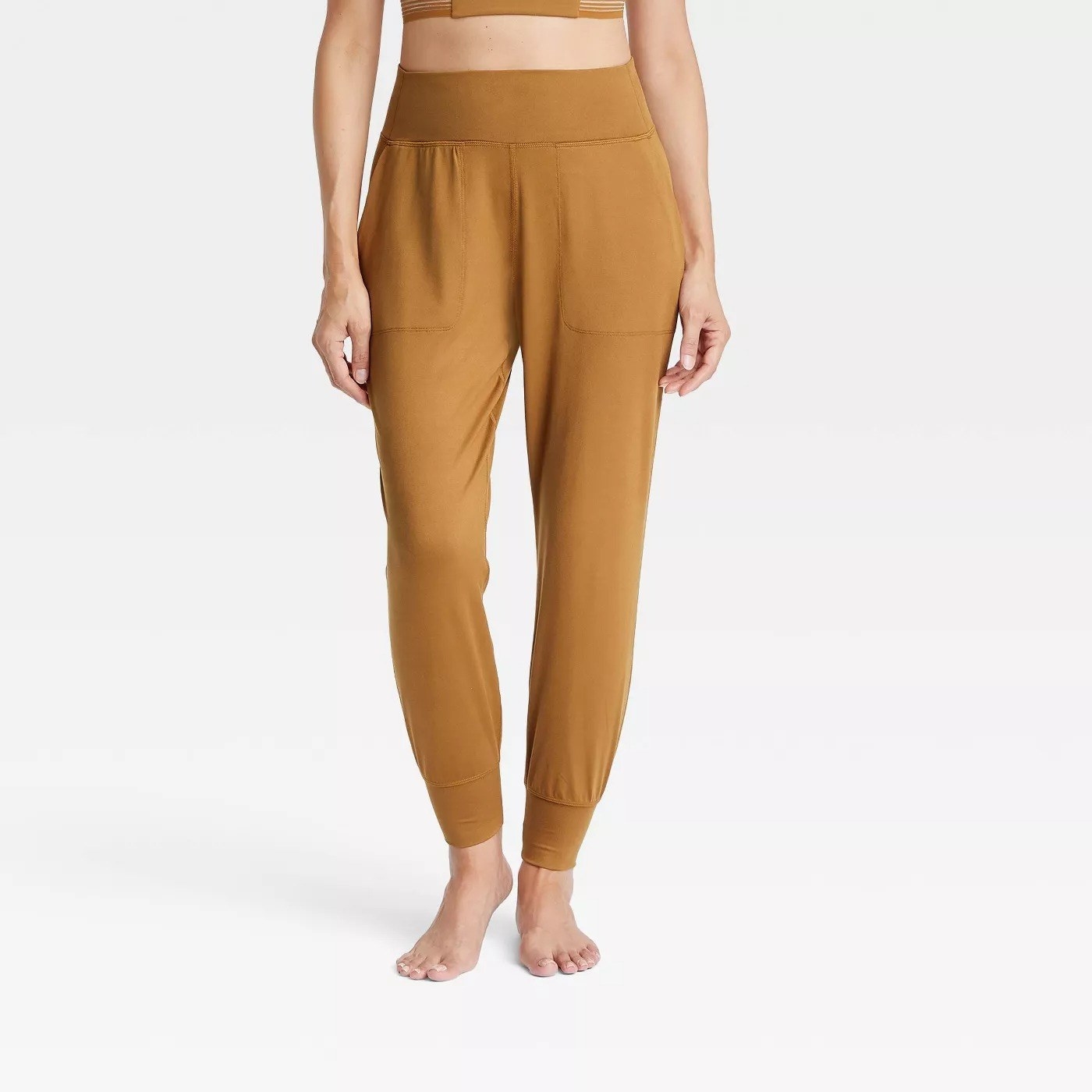 The high-waisted, mustard-colored joggers