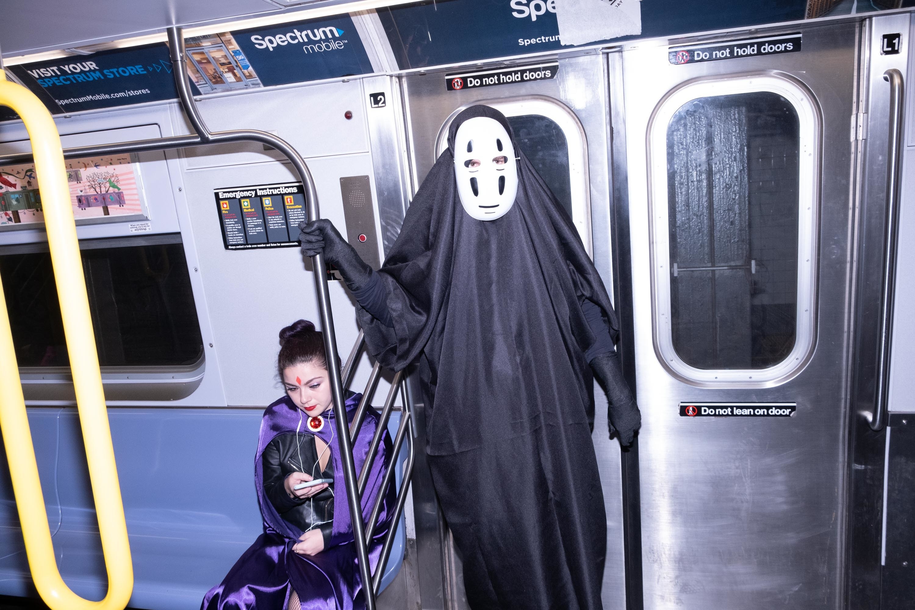 A ghost on a subway, a witch sits next to him