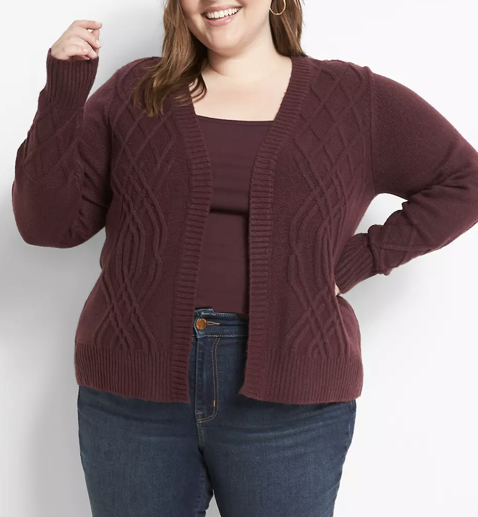 model wearing an open front sweater in cableknit