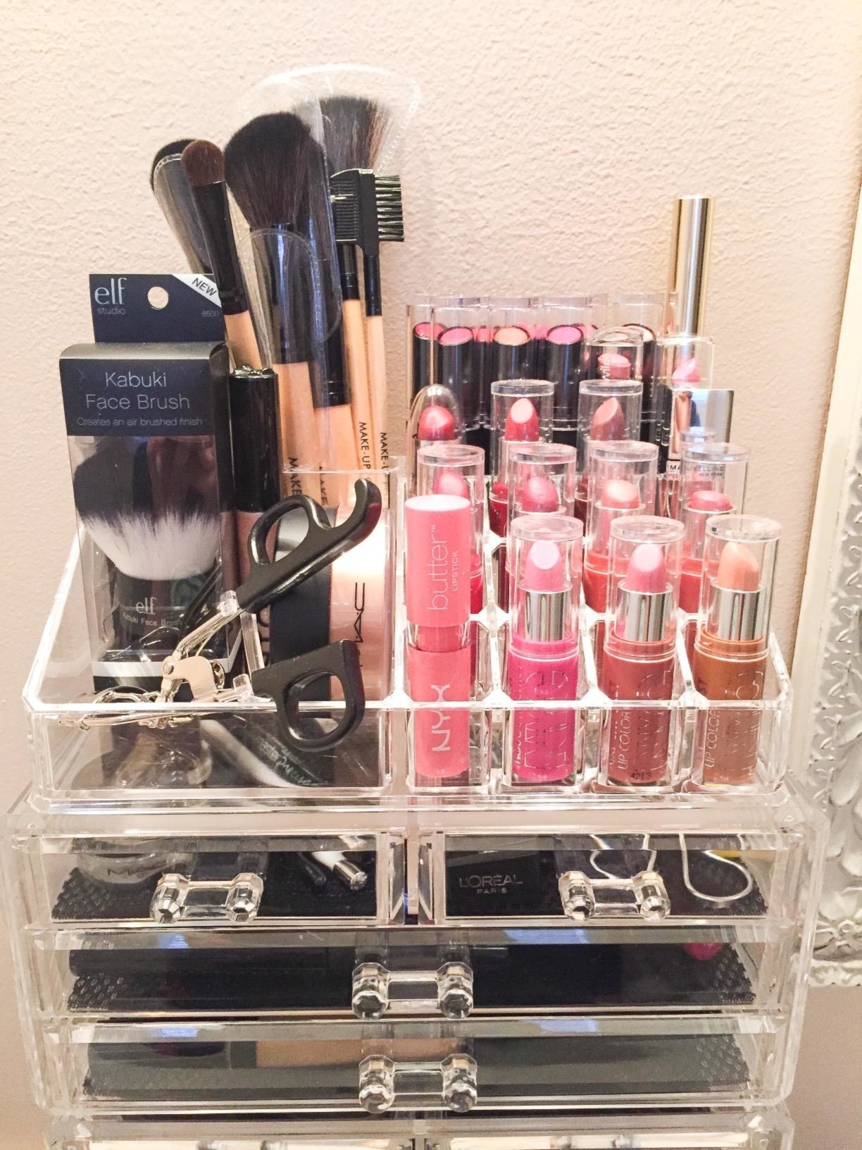 The clear Ikee Design Jewelry &amp;amp; Cosmetic Storage Display Boxes filled with makeup