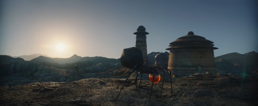 A robotic spider walks on desert planet