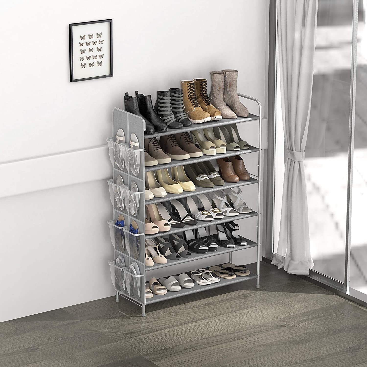 A shoe rack with six tiers and filled with shoes