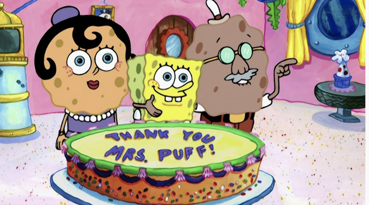 SpongeBob and his parents standing in front of a thank you cake