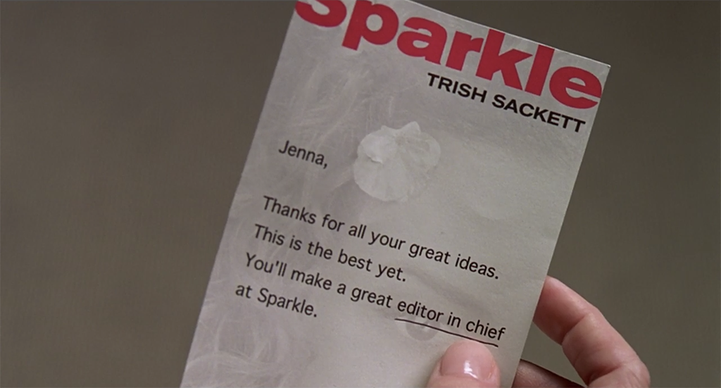 Jenna holds a letter from rival magazine Sparkle that reveals she is the employee that&#x27;s been sabotaging Poise magazine all along