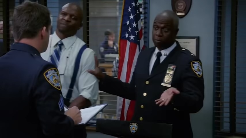 Holt escorting Terry away while speaking to Sergeant Wells in &quot;Brooklyn Nine-Nine&quot;