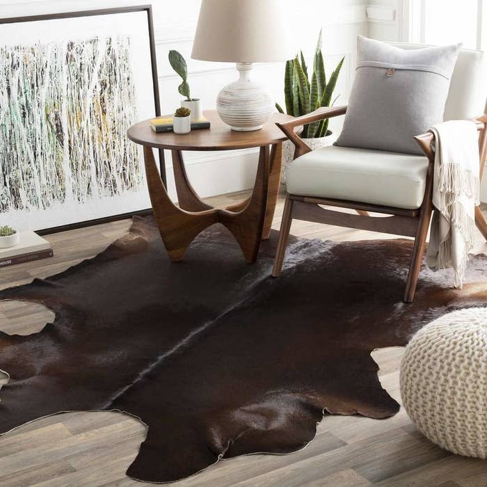 cowhide rug in rich dark brown