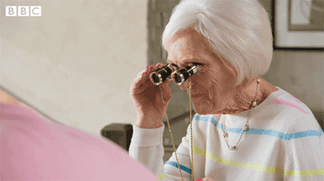 Gif of Mary Berry using a pair of binoculars