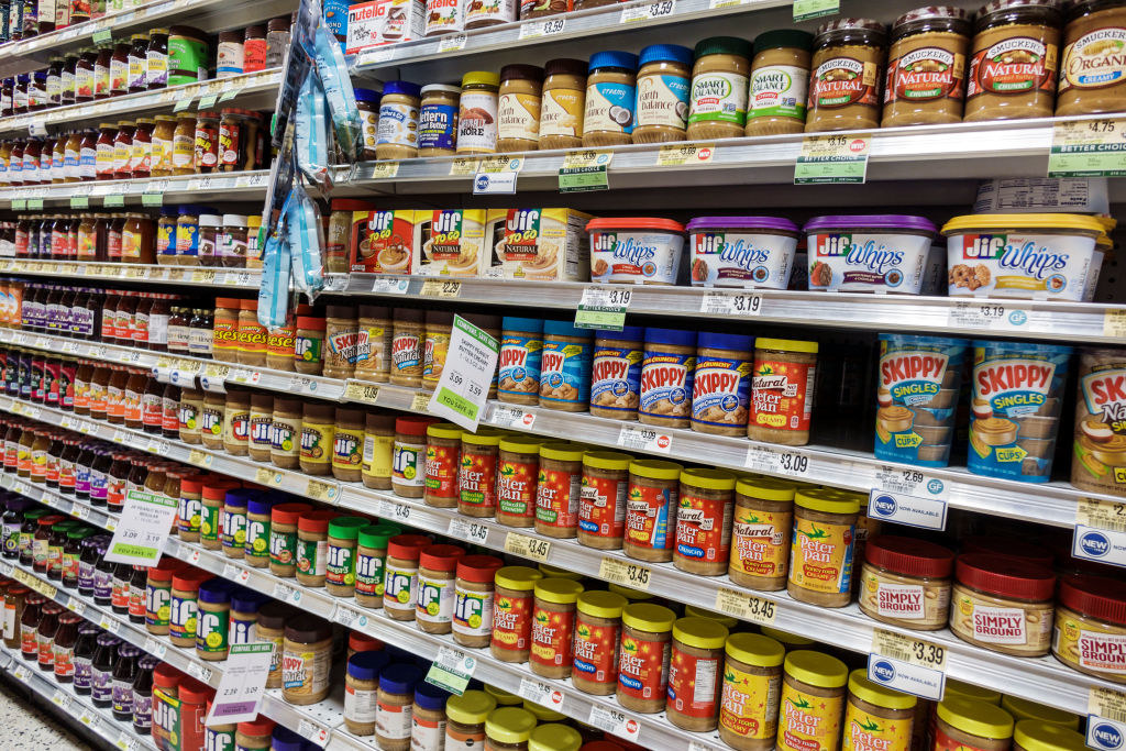 The peanut butter aisle at a grocery store.