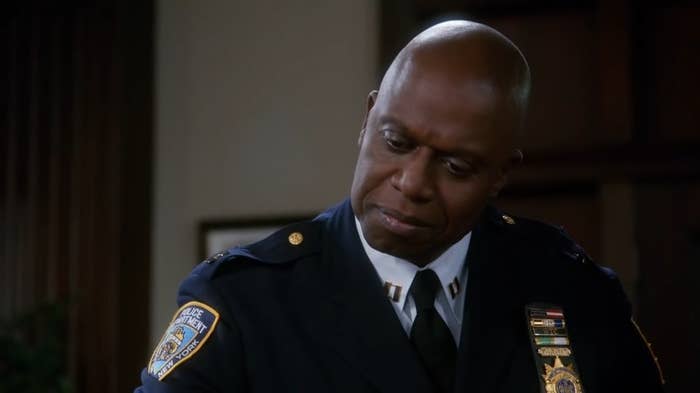 Holt flirting with a woman in "Brooklyn Nine-Nine"