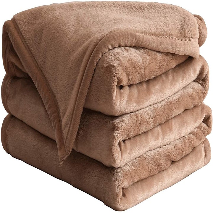 Light camel brown blanket folded up