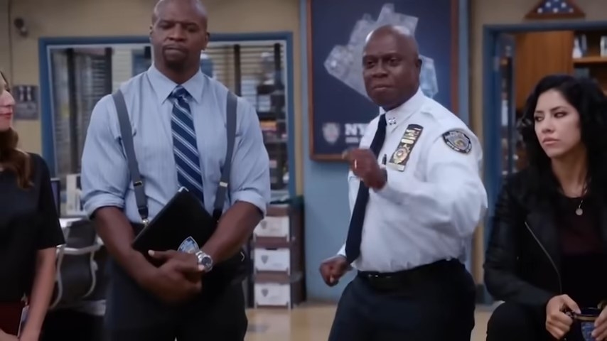 Holt celebrating after winning a bet against his precinct in &quot;Brooklyn Nine-Nine&quot;