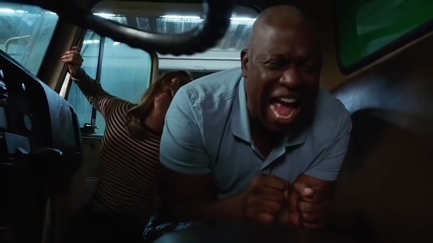 Gina trying to push Holt up into a truck as he yells in &quot;Brooklyn Nine-Nine&quot;