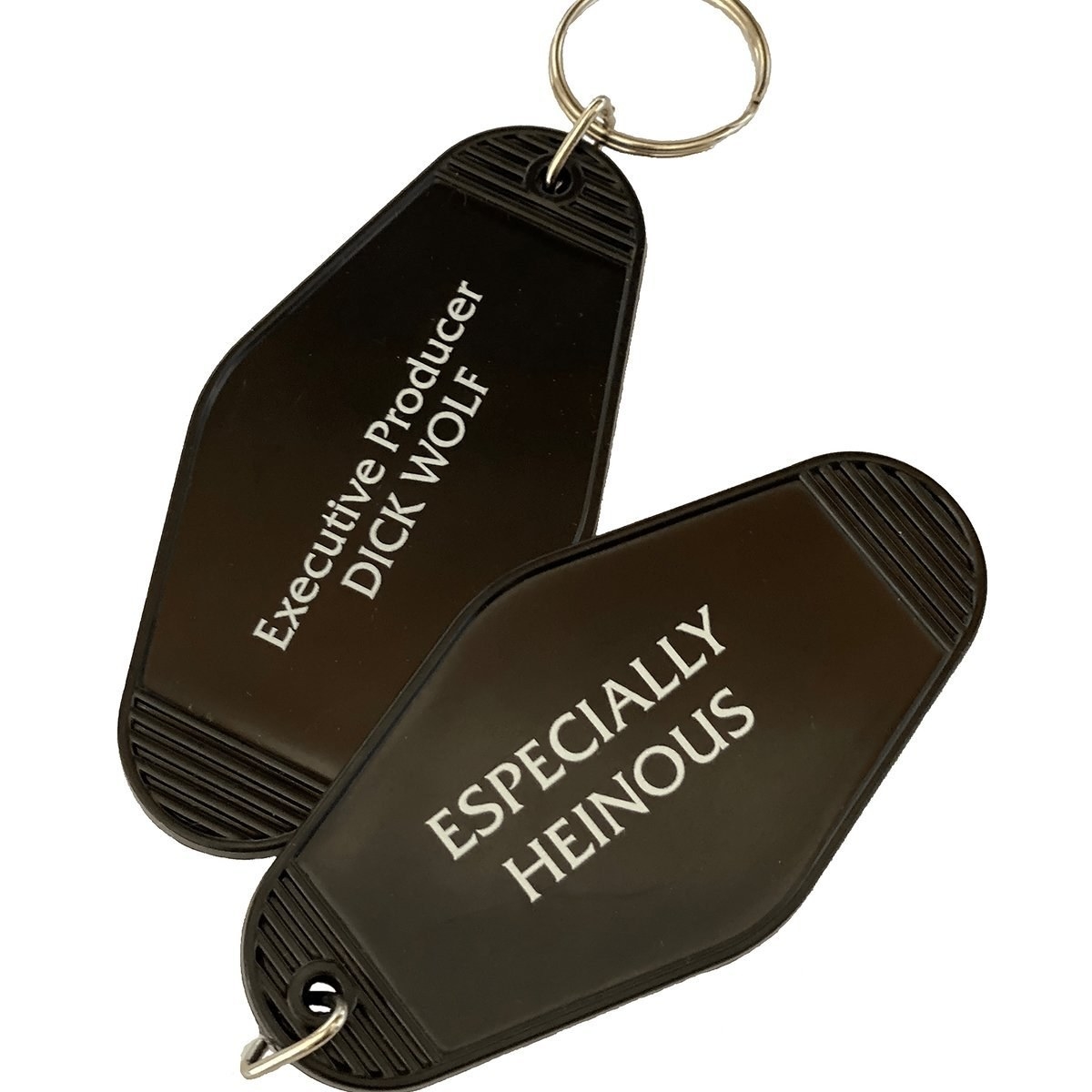 the black keychain which says &quot;executive producer Dick Wolf&quot; on one side and &quot;especially heinous&quot; on the other