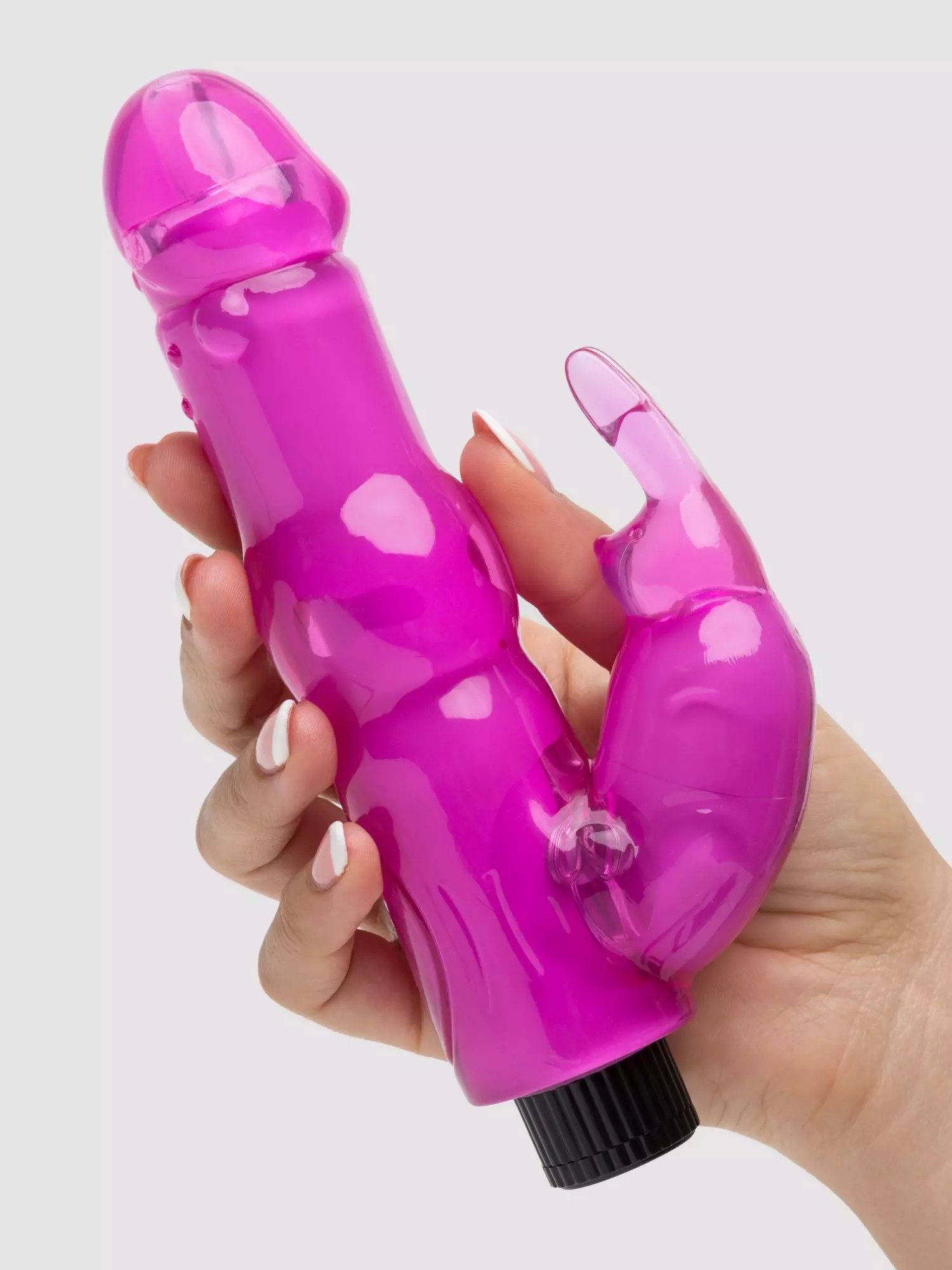 Model holding pink rabbit vibrator