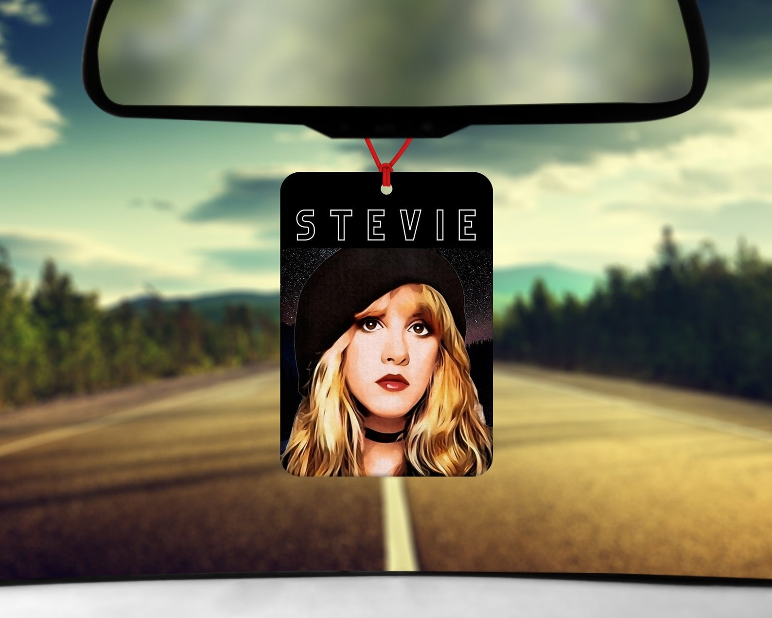 The air freshener which is a photo of a young Stevie Nicks