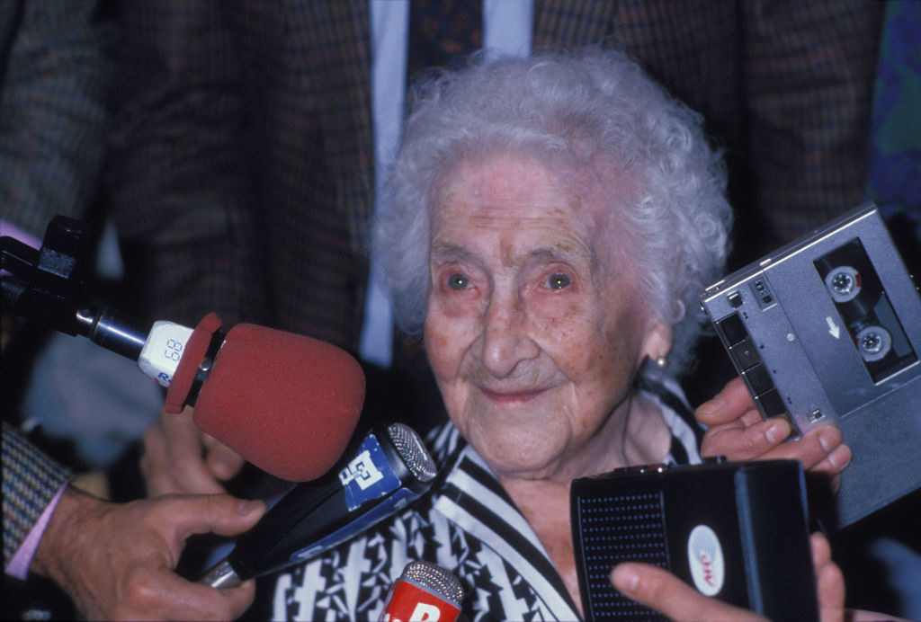 Jeanne Calment surrounded by press