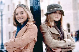 Mary-Kate and Ashley leaning against a pole as Chloe as Riley in Winning London