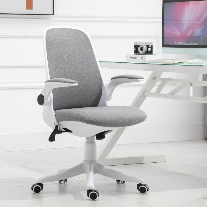 the ergonomic office chair in grey and white