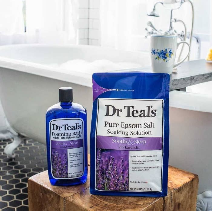 a bottle of bubble bath and a bag of soaking solution