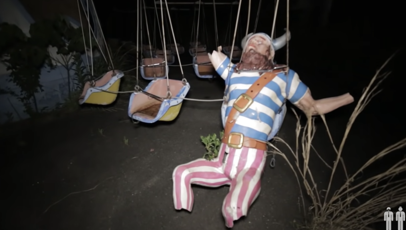 pirate figure stuck on swing ride