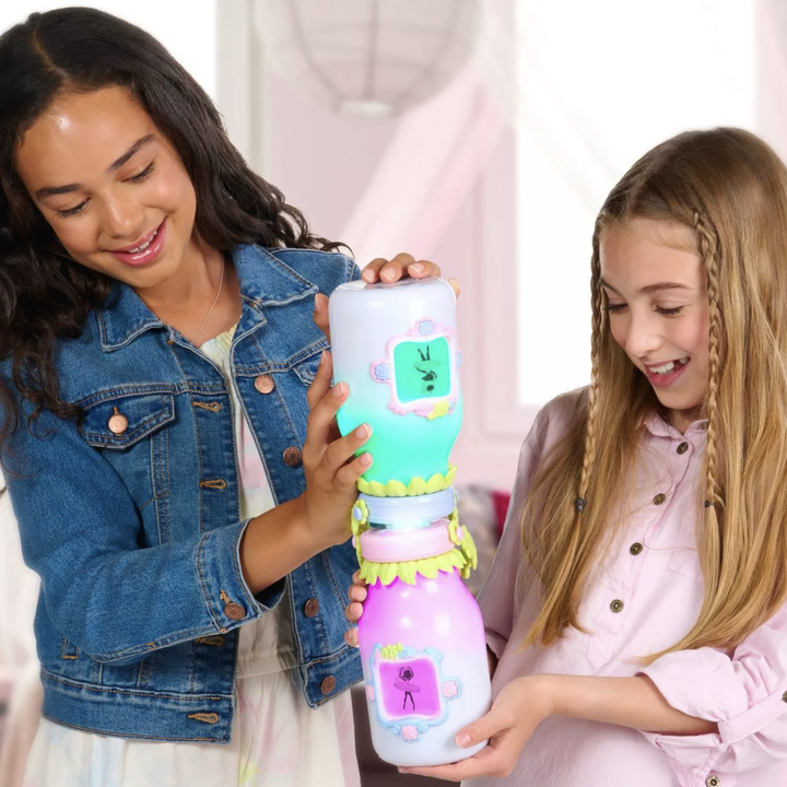 Children holding Got2Glow Fairy Finders