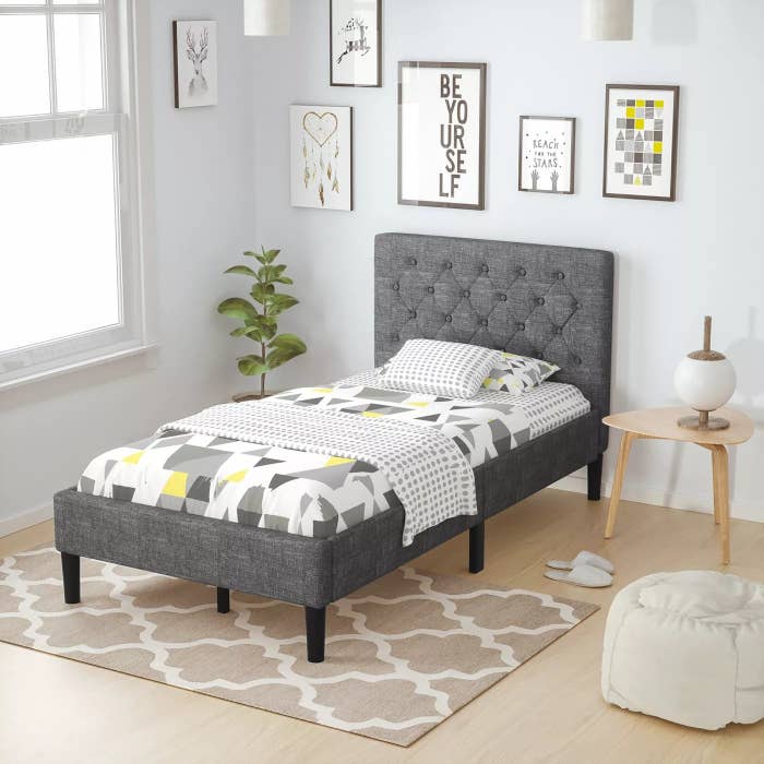 The gray bed frame