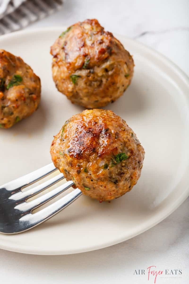 Crispy turkey meatballs on a plate.