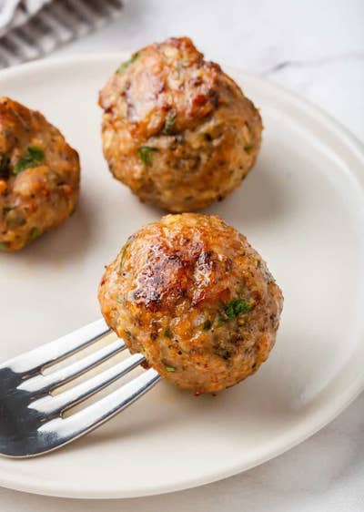 Crispy turkey meatballs on a plate.