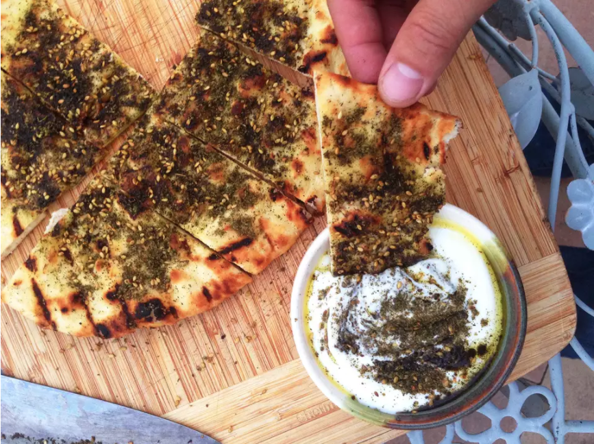 Grilled flatbread topped with a za&#x27;atar and olive oil blend
