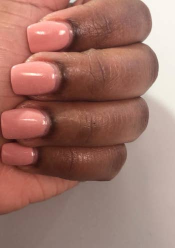 reviewer with healthy-looking cuticles