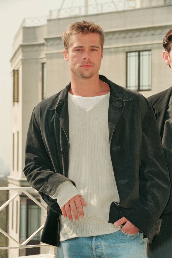 Brad at the legends of the fall premiere in a sweater, jeans, and a jacket sexiest man alive