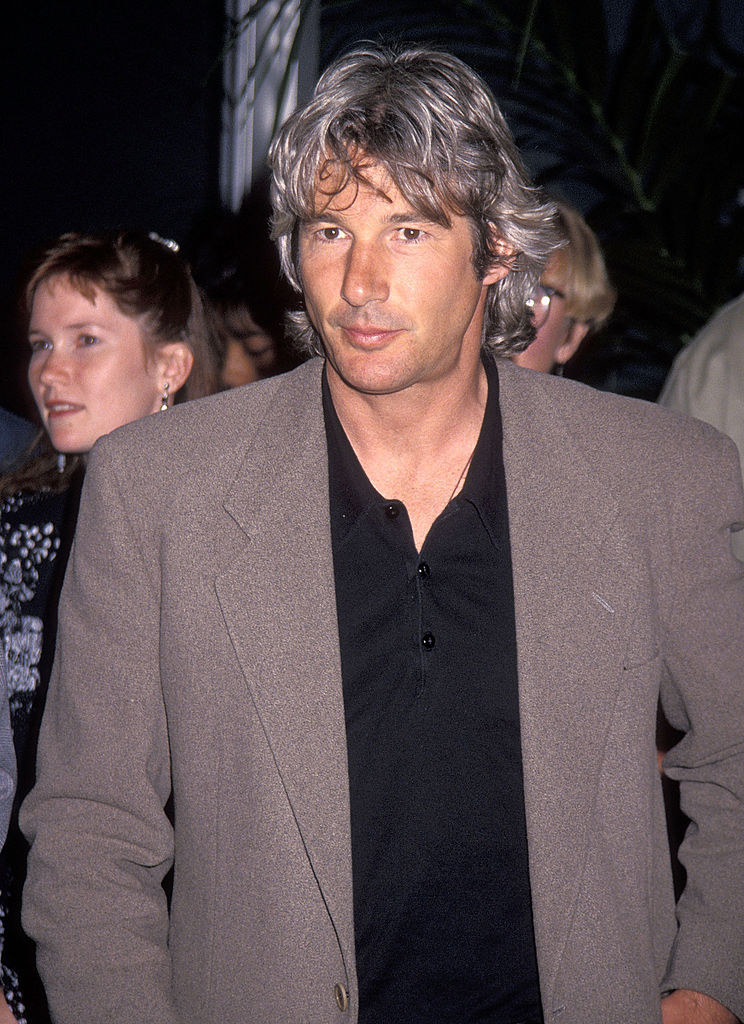 Richard at an event wearing a shirt and blazer
