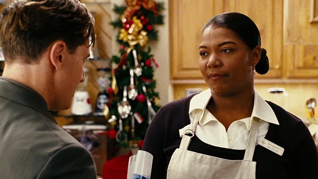 Queen Latifah working as a sample cook at a department store