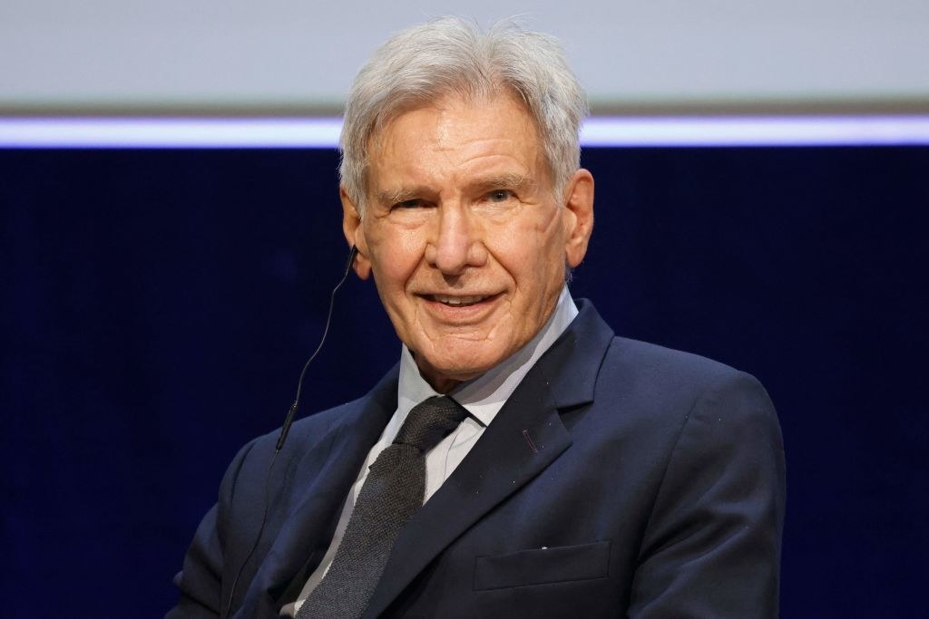 Harrison smiles at a conservation conference in france