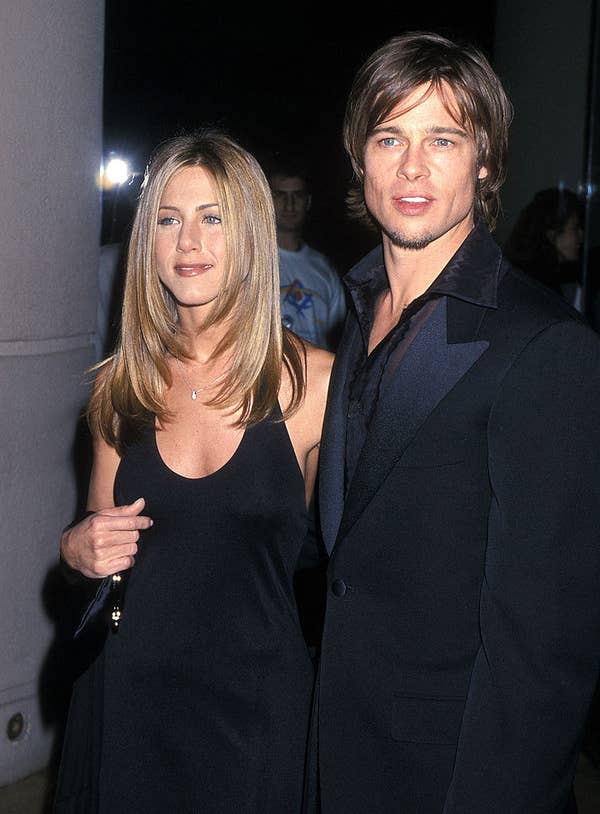 Brad arm-in-arm with jen aniston at an event sexiest man alive