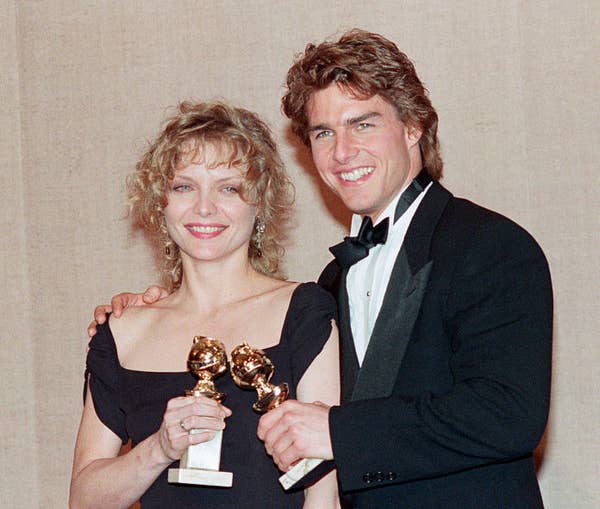 with michelle pheiffer posing with their golden globes