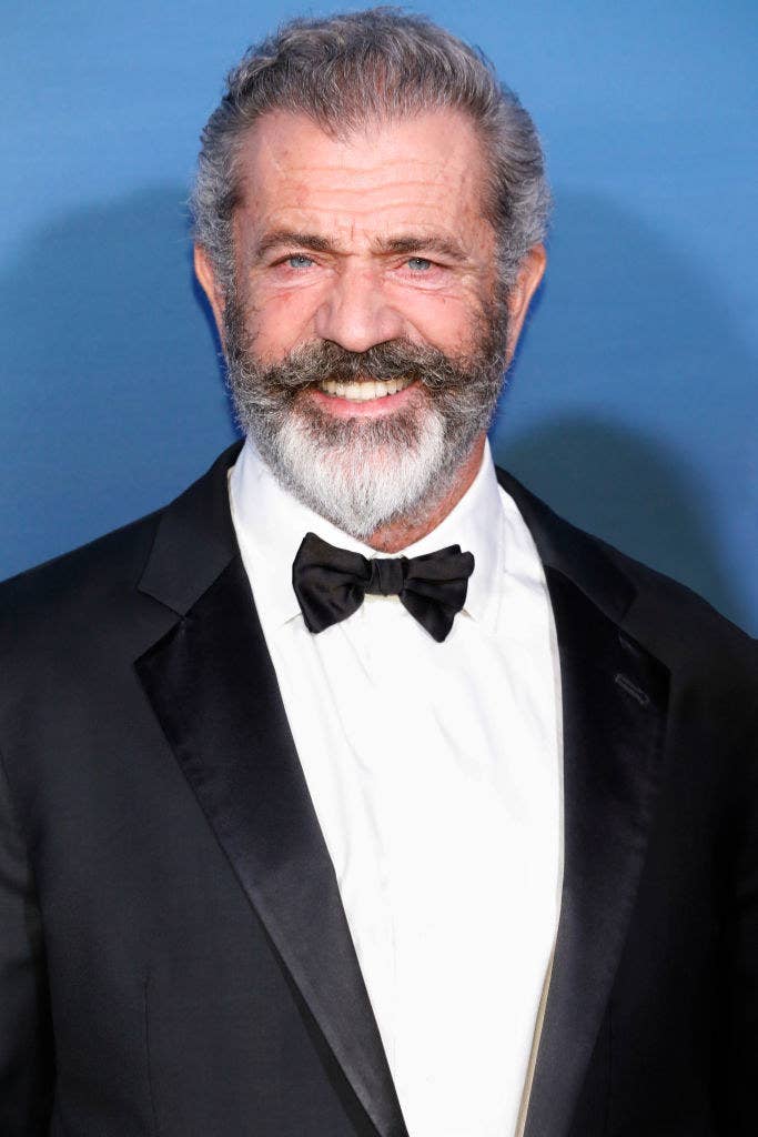 Mel at a black tie event in 2019 with a full beard