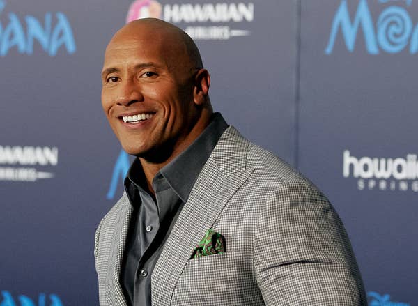 Dwayne smiles at moana premiere sexiest man alive