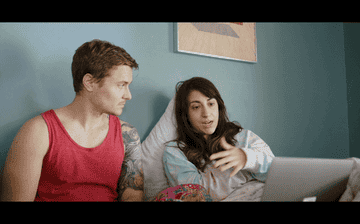 A gif of Leah and Nick on a video call in bed in &quot;The End of Us&quot; film