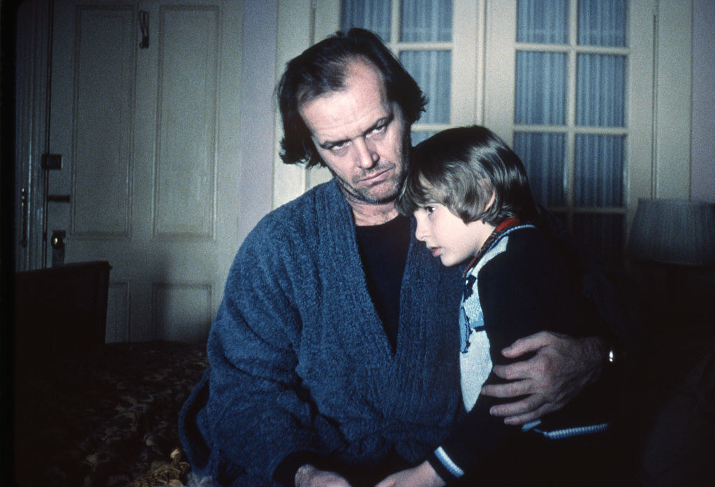 Dan Lloyd being embraced by Jack Nicholson in the shining